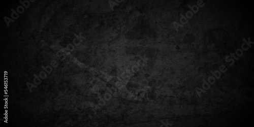Black and white stone concrete grunge wall texture and backdrop background anthracite panorama. Panorama dark black or blue slate background or texture. © MdLothfor