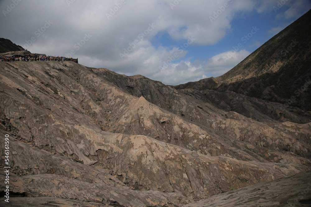 view of steep rocky and sandy hills with clear sky