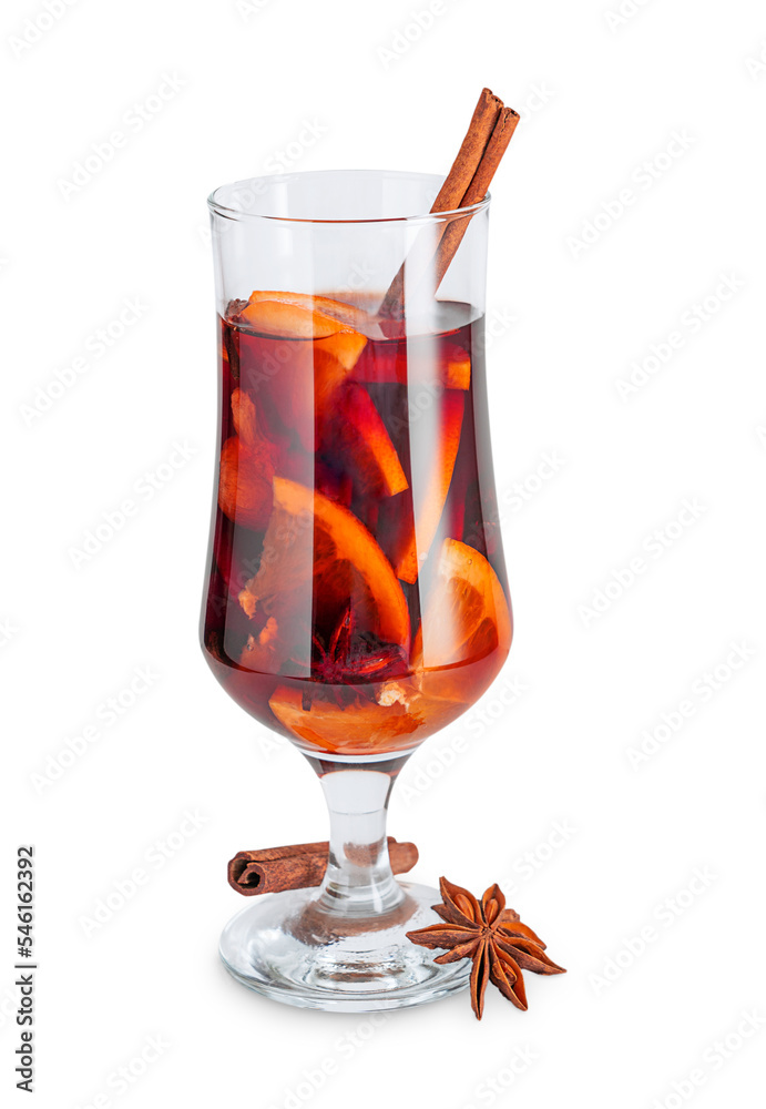 Mulled or spiced red wine alcoholic drink made with sliced orange and mulling spices as cinnamon stick and anise served hot in glass prepared at winter and christmas isolated on white background