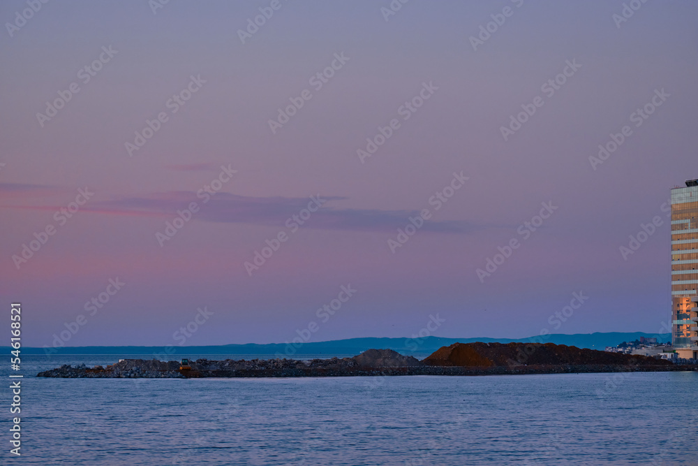 View of the Amur Bay at sunset. View of the Amur Bay at sunset.