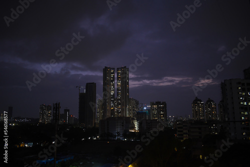 Dark skyline of the suburb of Kandivali in the city of Mumbai at night.