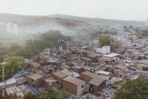 Aerial view of slums on a hillside on the outskirts of the Borivali National Park. photo