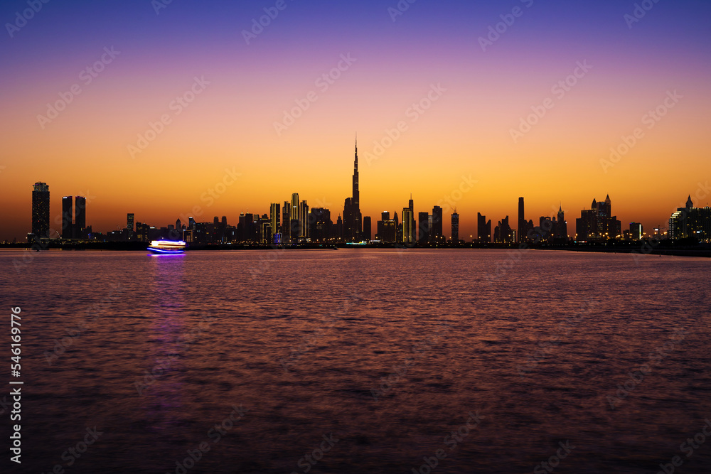 Night view of Dubai Skyline buildings. A shot of Dubai Skyscrapers a view from Jaddaf walk. Night view of Dubai Skyline buildings. A shot of Dubai Skyscrapers a view from Jaddaf walk.