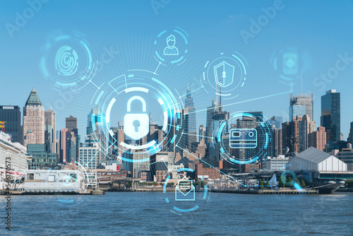 New York City skyline from New Jersey over the Hudson River towards Midtown Manhattan at day time. The concept of cyber security to protect confidential information, padlock hologram