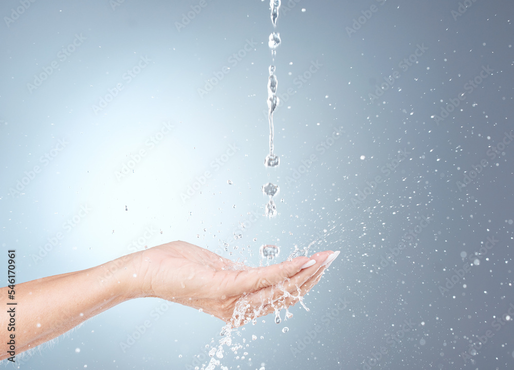 Hand, skincare and water splash for clean skin, hygiene and morning beauty routine mockup. Natural hydration, facial moisturization and liquid refreshment on a gray studio background for advertising