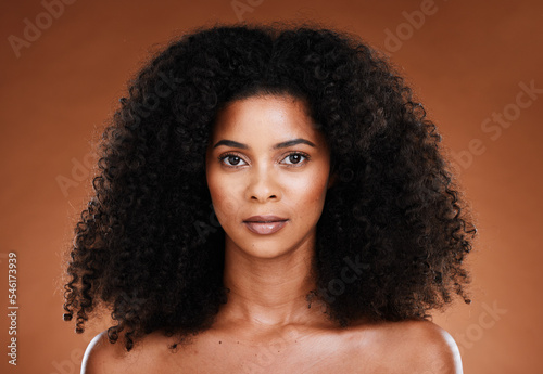 Beauty  hair care and portrait of black woman with skincare treatment  luxury facial cosmetics or clean glowing skin. Self care routine  makeup and face of model with afro hair volume after spa salon