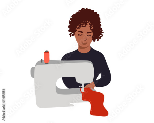 A young, happy african seamstress or dressmaker works on a sewing machine. Black seamstress women. Flat vector illustration