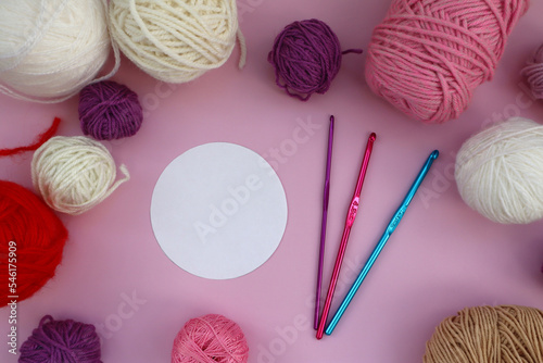 Craft knitting with crochet. Hobbies, handicrafts and handmade work. Threads, balls of yarn.