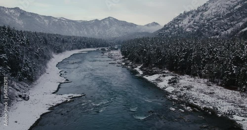 Wallpaper Mural Aerial view on the river and forest at the winter time. Natural winter landscape from air.Landscape from drone. Forest under snow a the winter time. Torontodigital.ca