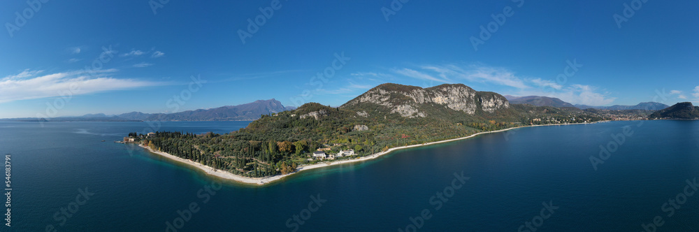 Naklejka premium Aerial view of the city of Garda, Lake Garda. Coastline of the town of Garda overlooking Lake Garda, Italy.