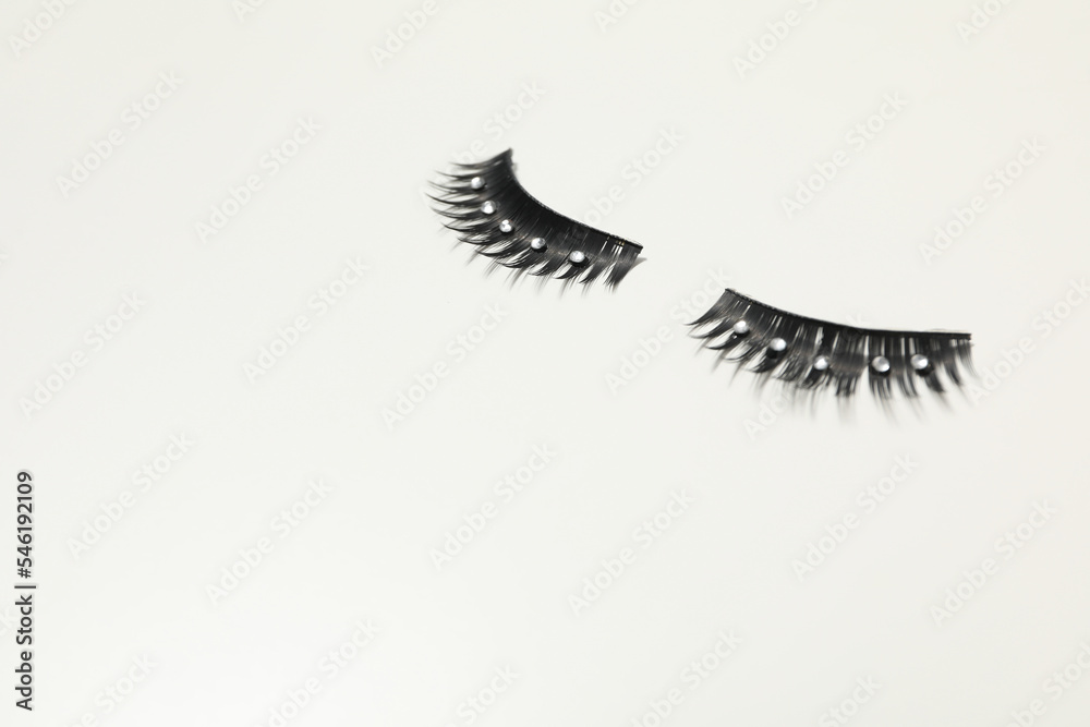 Сoncept of cosmetology tools and beauty treatment, false eyelashes Сoncept of cosmetology tools and beauty treatment, false eyelashes