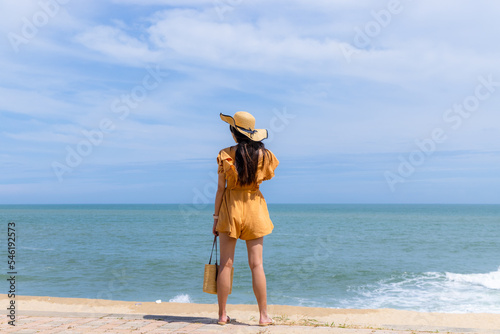 Woman on the sand beach © leungchopan
