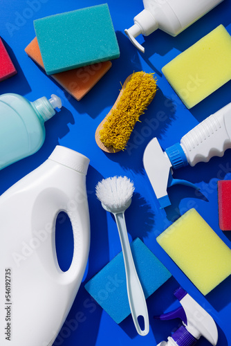 Cleaning supplies tools, white soap packaging, detergents