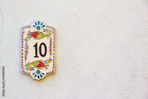 Decoration ceramic ten number with tulip figure , copy space