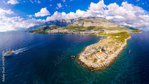 Fototapeta Naklejka Na Ścianę i Meble -  Turquoise sea and stone beach by pine trees view, Dalmatia, Croatia