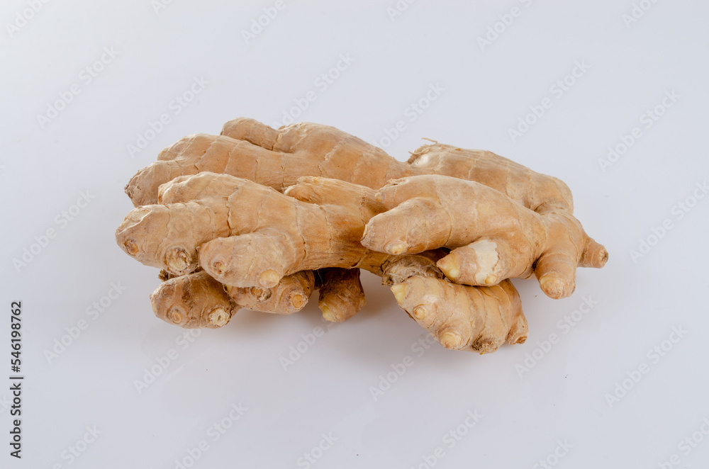 Ginger root on white background with reflection Ginger root on white background with reflection