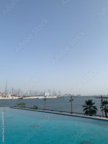 Large infinity pool with a view of the Dubai skyline in the United Arab Emirates © traveladdict