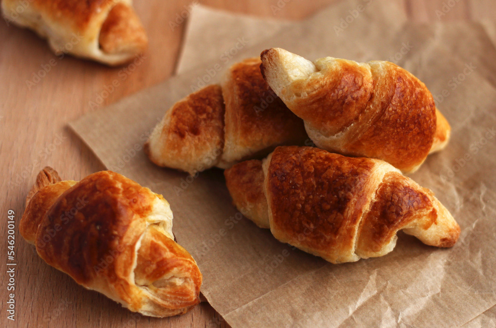 homemade confectionery French croissant on a beige background