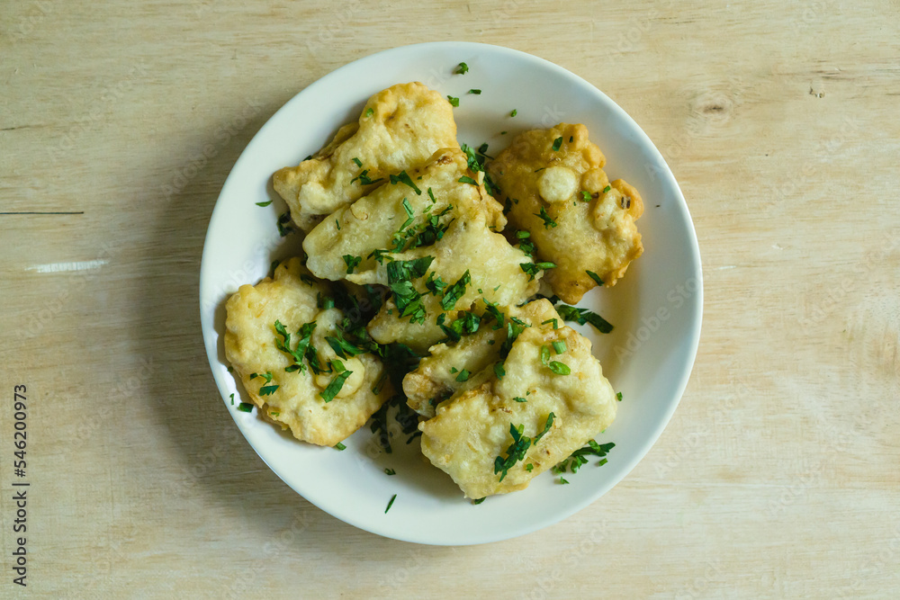 The Mendoans, a traditional food from soybean with flour, served in white plate