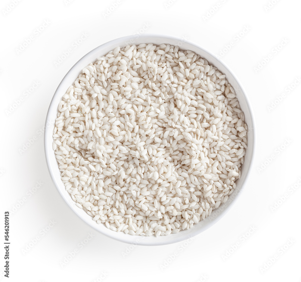 Uncooked arborio rice in white bowl isolated on white background with clipping path