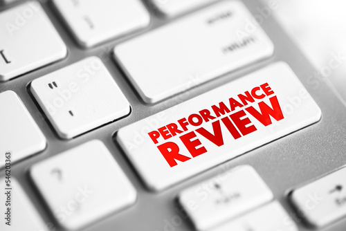 Performance Review - formal assessment in which a manager evaluates an employee's work performance, text concept button on keyboard