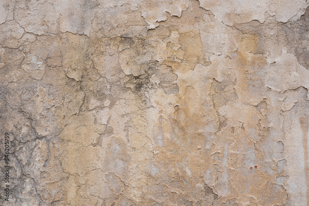 Old yellow grey wall with chipped paint, texture, background Old yellow grey wall with chipped paint, texture, background