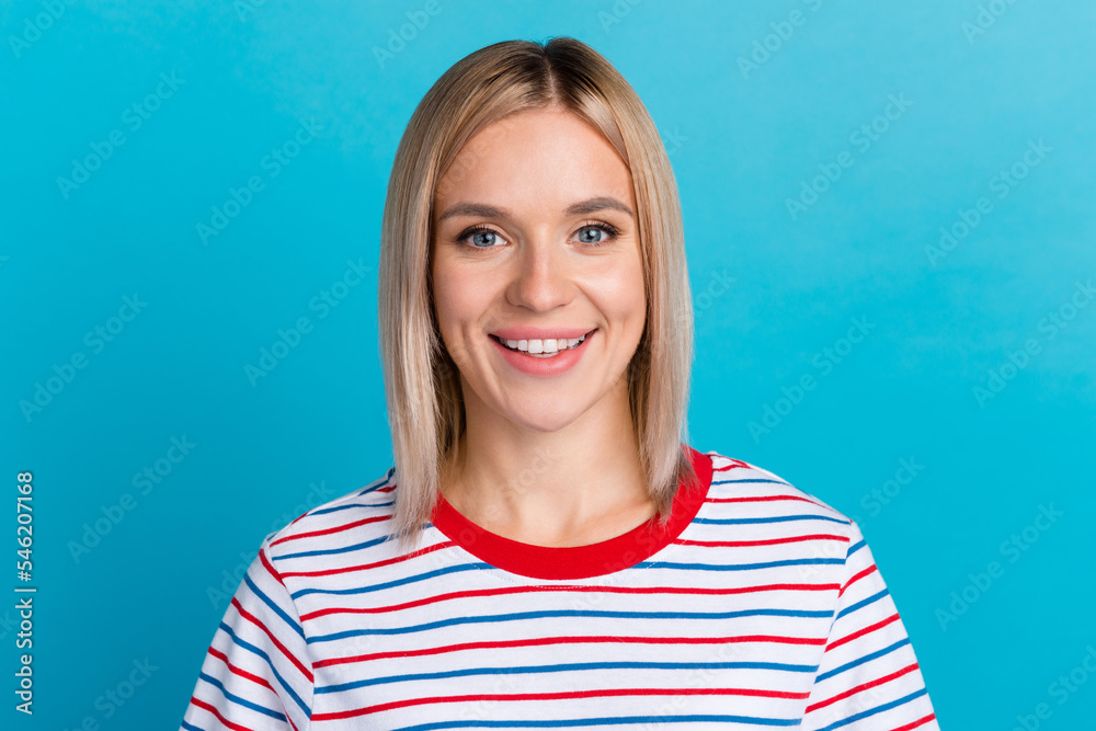 Portrait of good-looking caucasian woman laughing standing against blue background. Positive Fashionable girl Portrait of good-looking caucasian woman laughing standing against blue background. Positive Fashionable girl