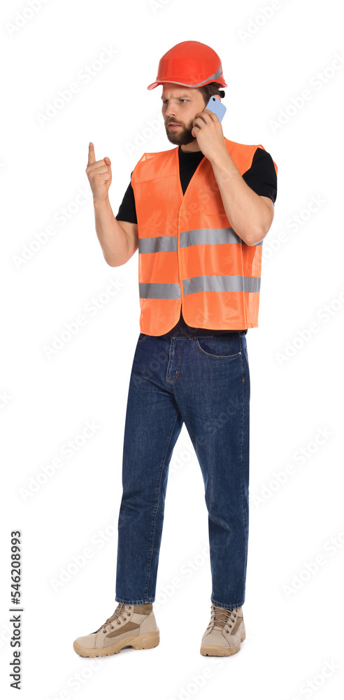 Man in reflective uniform talking on smartphone against white background Man in reflective uniform talking on smartphone against white background