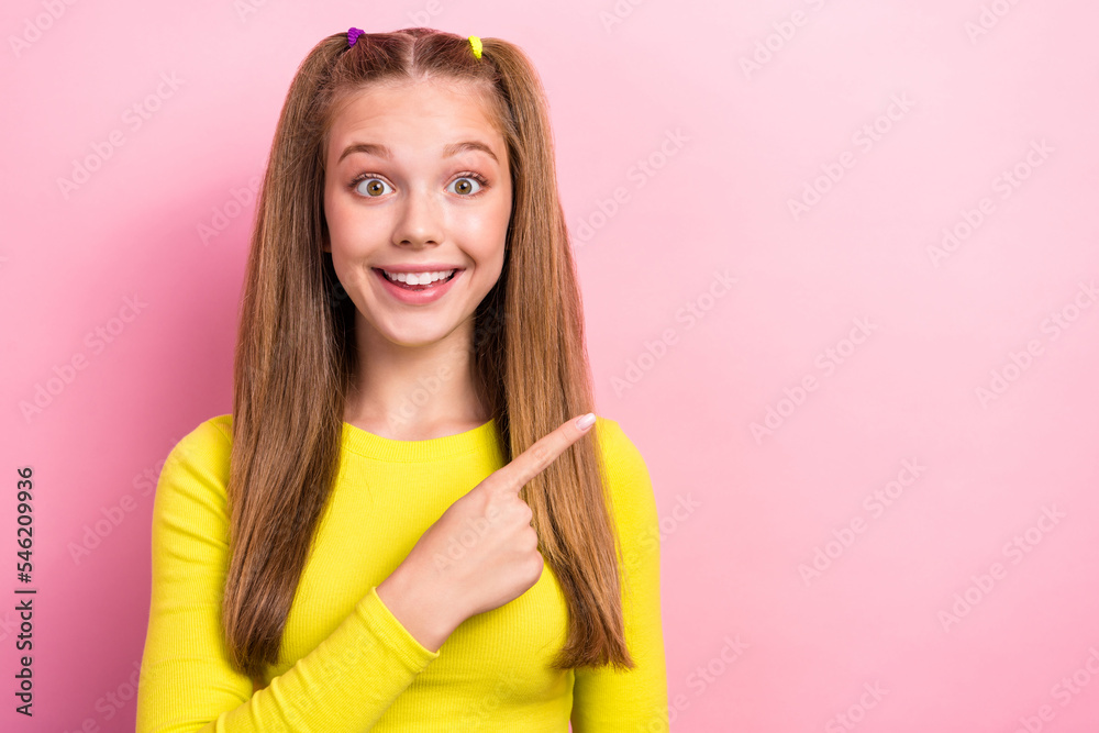 Photo of positive cute lady arm direct empty space rejoice offer proposition recommend new boutique isolated on pink color background Photo of positive cute lady arm direct empty space rejoice offer proposition recommend new boutique isolated on pink color background
