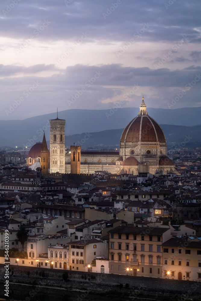 View of Santa Maria Del Fiore Cathedral in Florence in the evening with dramatic sky. Italy. Travel. Tourism.