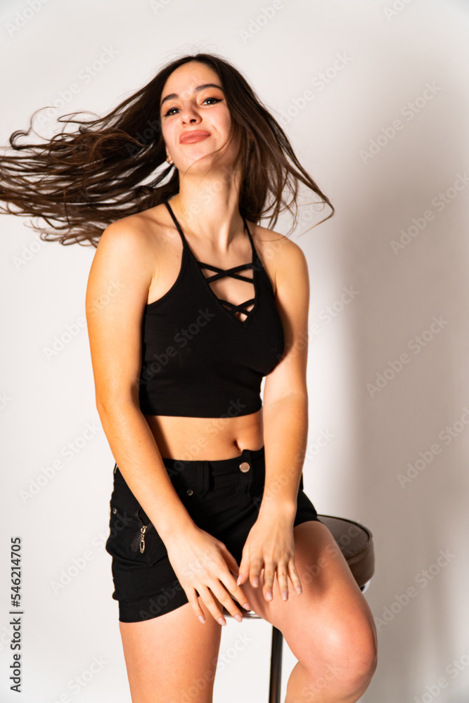 Portrait of disconcerted young woman in light clothes looking aside covering nose with hand isolated on white wall background in studio. People sincere emotions, lifestyle concept. Mock up copy space Portrait of disconcerted young woman in light clothes looking aside covering nose with hand isolated on white wall background in studio. People sincere emotions, lifestyle concept. Mock up copy space