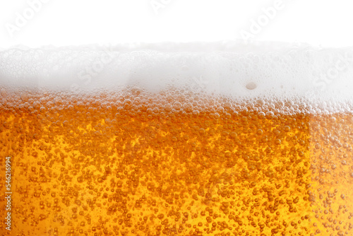 Tasty beer with foam in glass, closeup