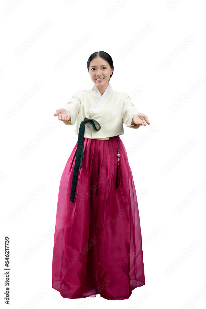 Asian woman wearing a traditional Korean national costume, Hanbok, standing with an open palms and showing something Asian woman wearing a traditional Korean national costume, Hanbok, standing with an open palms and showing something