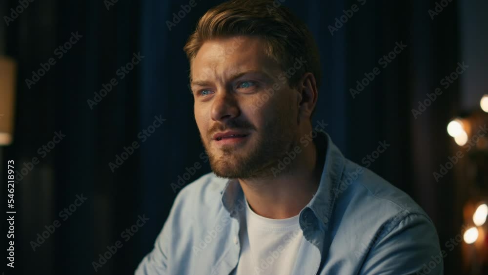 Positive man dancing chair at home closeup. Guy listening rhythmic music alone Positive man dancing chair at home closeup. Guy listening rhythmic music alone