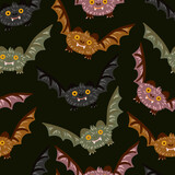 Flying soaring bats vector seamless pattern. Creepy Scary Halloween vampire bats texture for fabric, wallpaper or wrapping paper. Kids print.