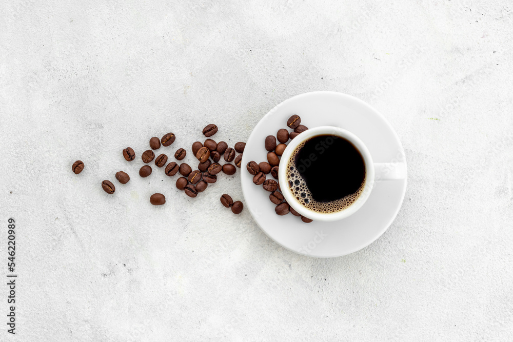 White cup of hot black espresso with coffee beans - obrazy, fototapety, plakaty 