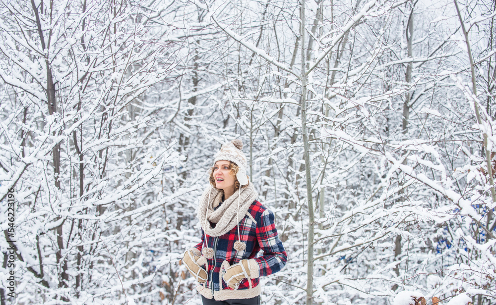 Cheerful emotional girl having fun outdoors. Winter outfit. Woman wear warm accessories stand in snowy nature. Winter fashion collection. Winter admirer. Favorite season. Walk in snowy forest Cheerful emotional girl having fun outdoors. Winter outfit. Woman wear warm accessories stand in snowy nature. Winter fashion collection. Winter admirer. Favorite season. Walk in snowy forest