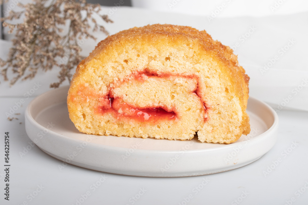 Strawberry Roll Cake on white background