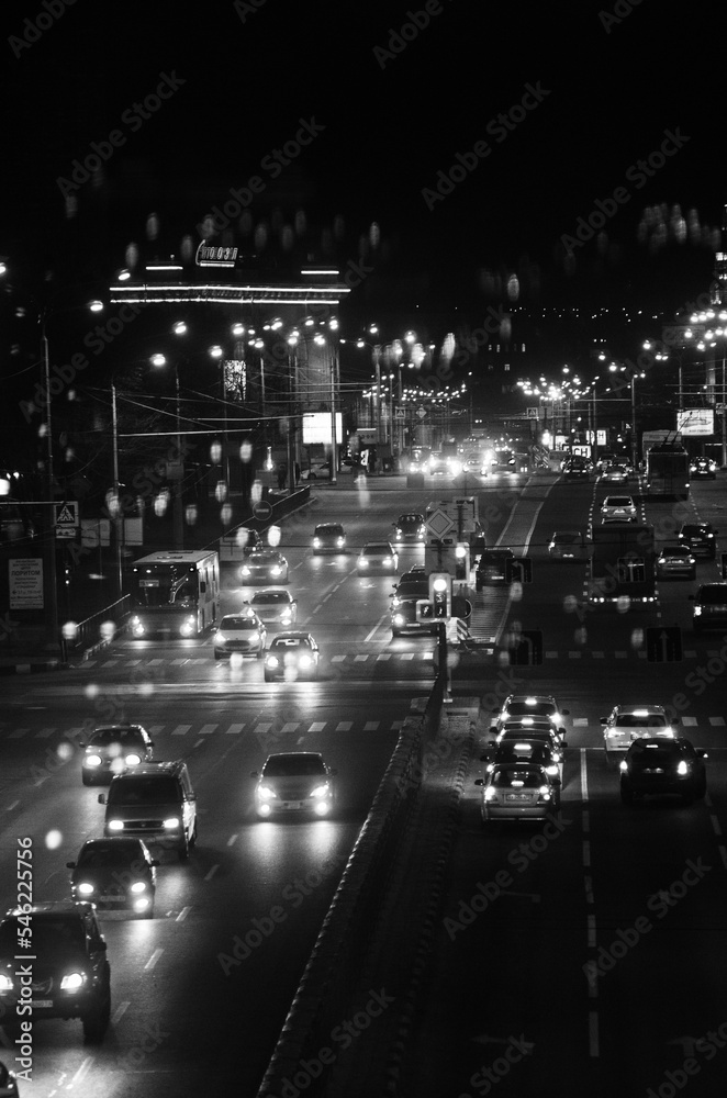 road at rush hour in the night city of kharkiv