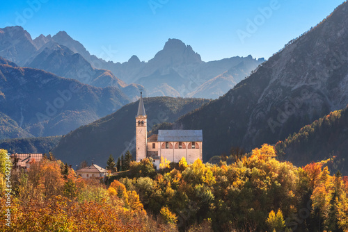Tableau sur toile Church in the mountains in autumn, Dolomites, Veneto, Italy