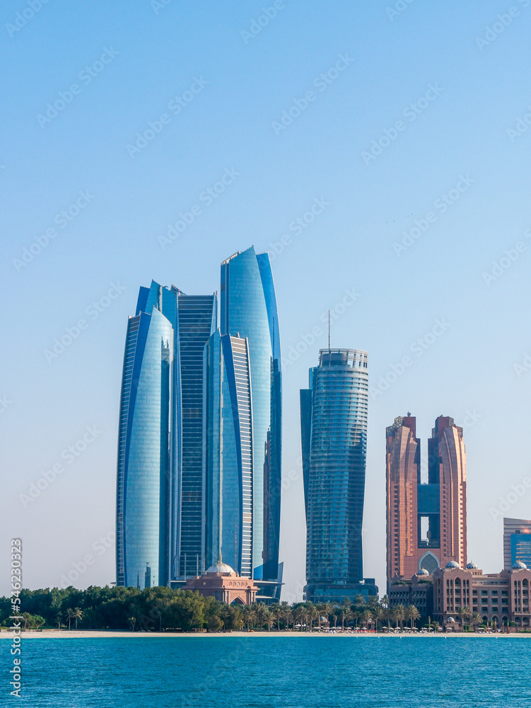 Business Area in Downtown Abu Dhabi, United Arab Emirates on a sunny afternoon - shot from across the water Business Area in Downtown Abu Dhabi, United Arab Emirates on a sunny afternoon - shot from across the water