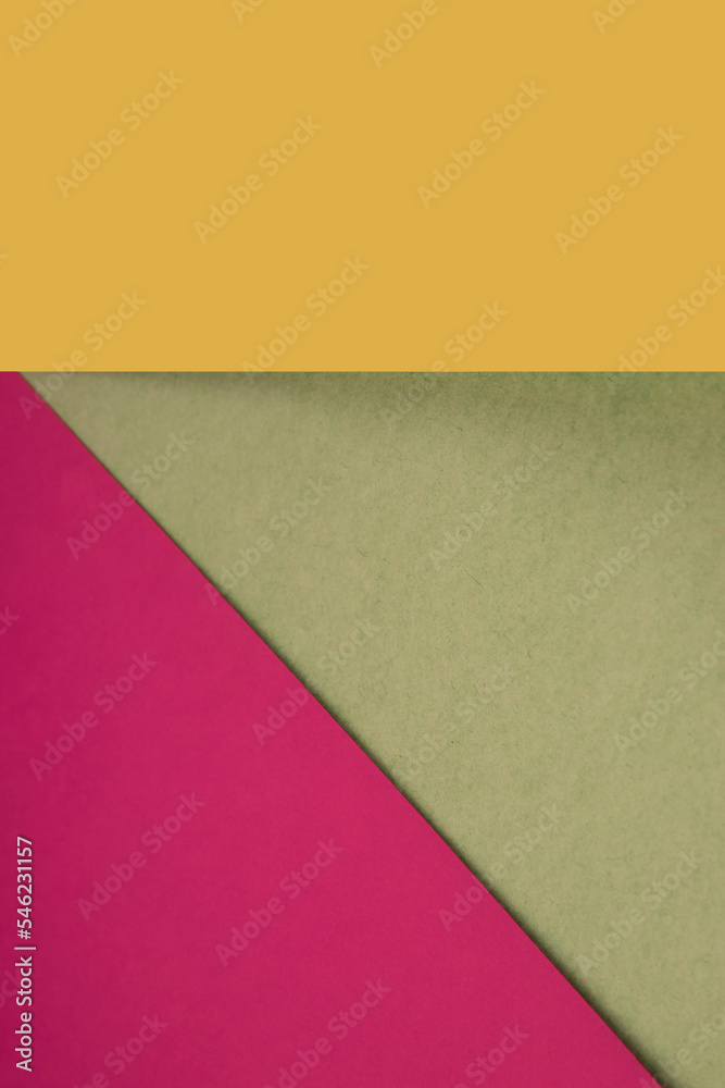 Textured and plain coloured papers forming two triangles and vertical blank rectangle for creative cover designing Textured and plain coloured papers forming two triangles and vertical blank rectangle for creative cover designing