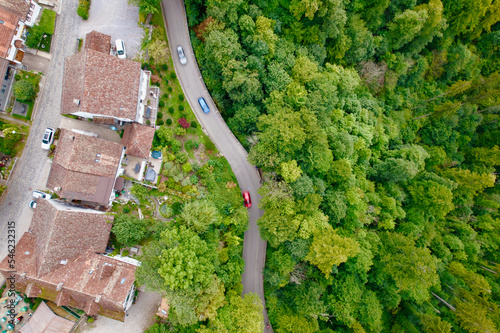 Aerial view of medieval village Kyburg with country road on a cloudy late summer day. Photo taken September 1st, 2022, Kyburg, Switzerland.