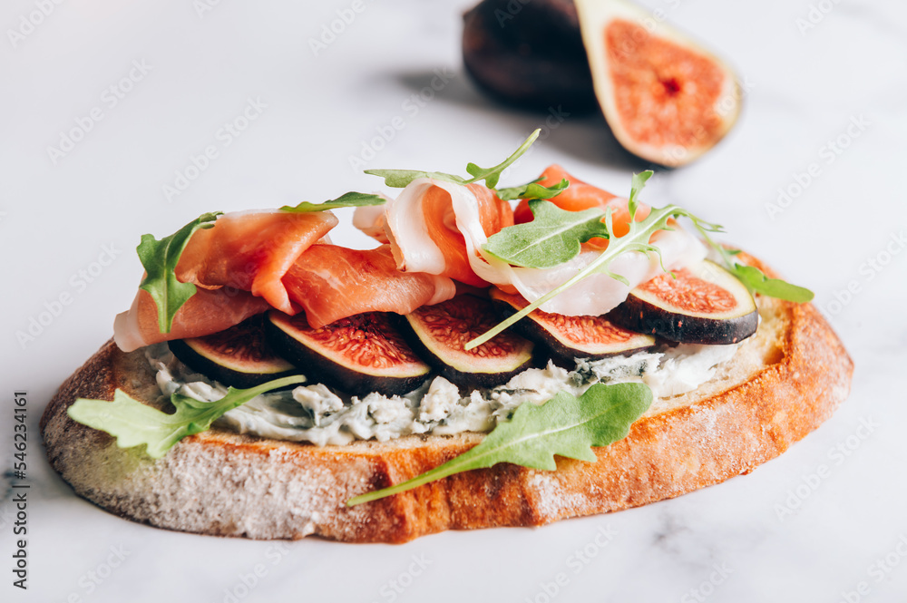 Open Sandwich with Blue Cheese, Figs, Rocket salad leaves and Prosciutto