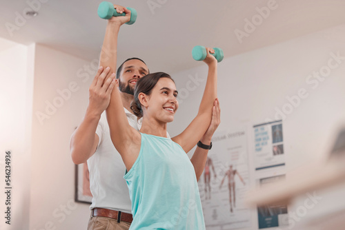 Fototapeta Naklejka Na Ścianę i Meble -  Physiotherapy, rehabilitation and arm weight exercise of a woman patient and consultant. Physical therapy, health and clinic consultation with weight for wellness consulting and fitness sport
