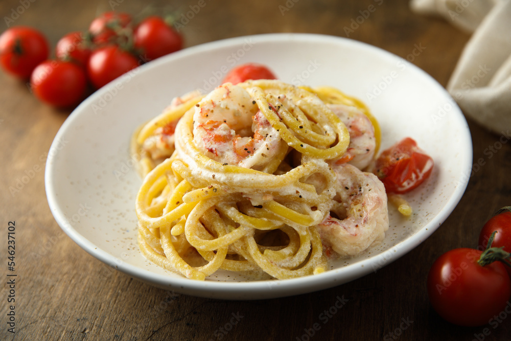 Homemade pasta with shrimps and cream Homemade pasta with shrimps and cream