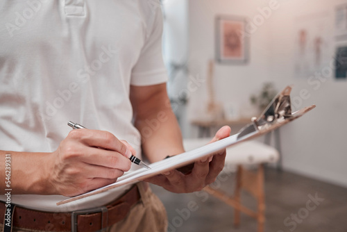 Physical therapy chiropractor and clipboard writing data of spa massage consultant or insurance note. Physiotherapy hands, healthcare consulting note and physio checklist schedule in a health clinic photo