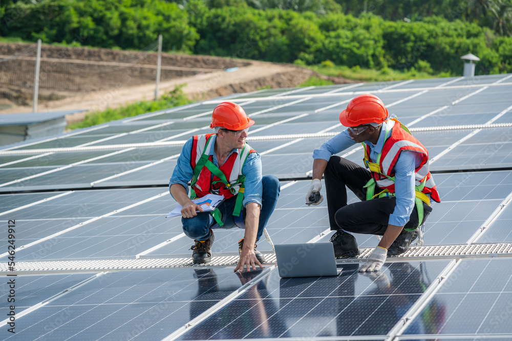 custom made wallpaper toronto digitalSolar panel energy,Electrical engineer man is working in solar station on roof using equipment,Alternative energy to conserve the world's energy.