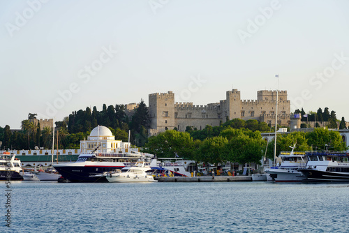 Marina and port of Rhodes with Palace of the Grand Master of the Knights of Rhodes  Greece