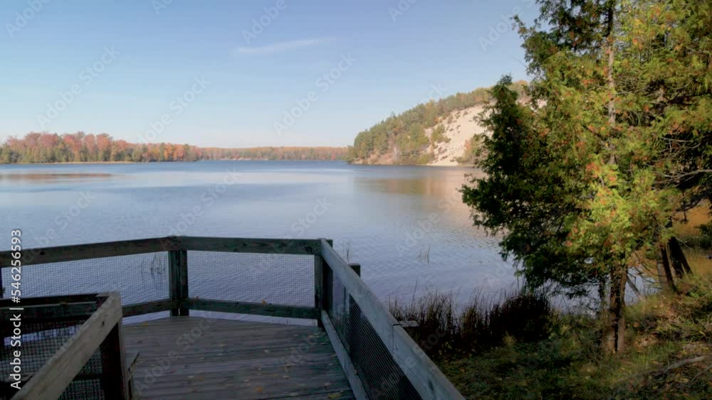 Au Sable River in Michigan during fall colors with gimbal video walking along pathway. Au Sable River in Michigan during fall colors with gimbal video walking along pathway.